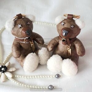 Coach Bear Bag Charm Signature Canvas Smooth 
Leather/Shearling ONLY ONE LEFT
